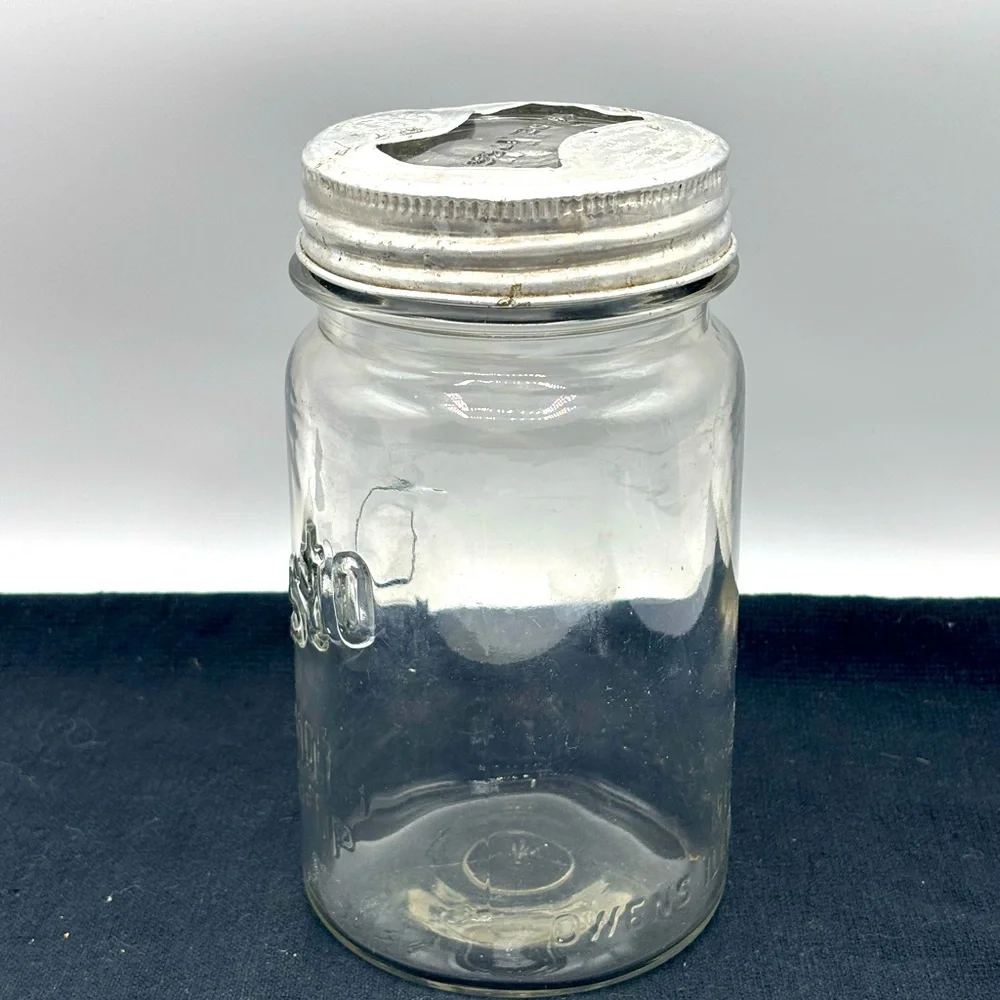 VTG. Rare Presto wide mouth cylindrical shape qt. Jar with glass bow tie lid.